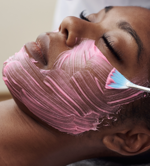 picture of Woman receiving a facial at Bodies Kneaded Massage Spa South Beach Miami Since 1996 www.BodiesKneaded.com 305.535.2424